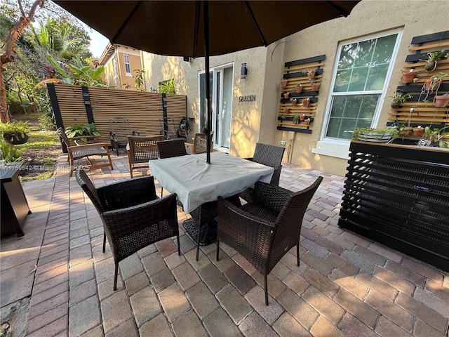 view of patio / terrace with an outdoor living space and outdoor dining area