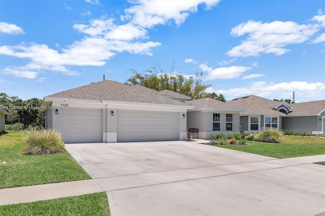 single story home with stucco siding, driveway, a front yard, a shingled roof, and a garage