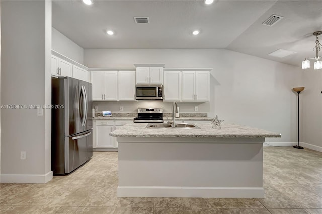 5338 Lugo St, Fort Pierce, FL 34951 - kitchen featuring visible vents, white cabinets, appliances with stainless steel finishes, and a sink