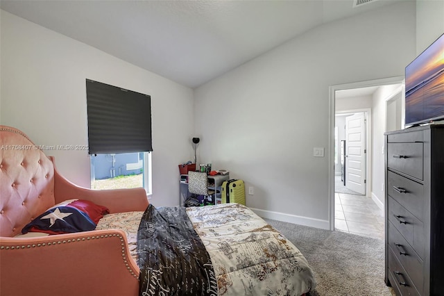 5338 Lugo St, Fort Pierce, FL 34951 - tiled bedroom with lofted ceiling, carpet, baseboards, and visible vents