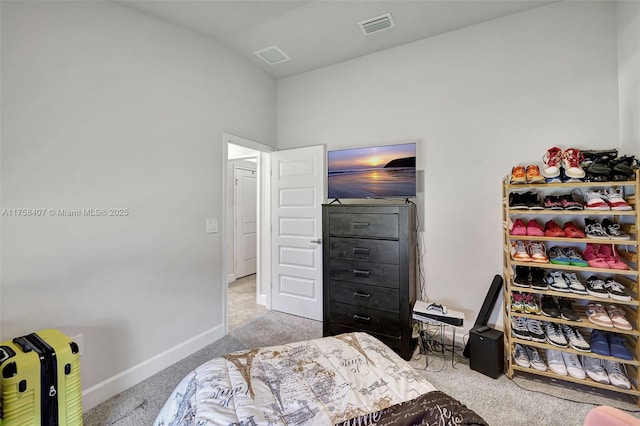 5338 Lugo St, Fort Pierce, FL 34951 - bedroom featuring baseboards, visible vents, lofted ceiling, and light carpet