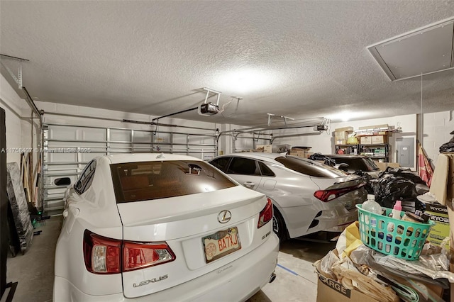 5338 Lugo St, Fort Pierce, FL 34951 - garage with electric panel and a garage door opener