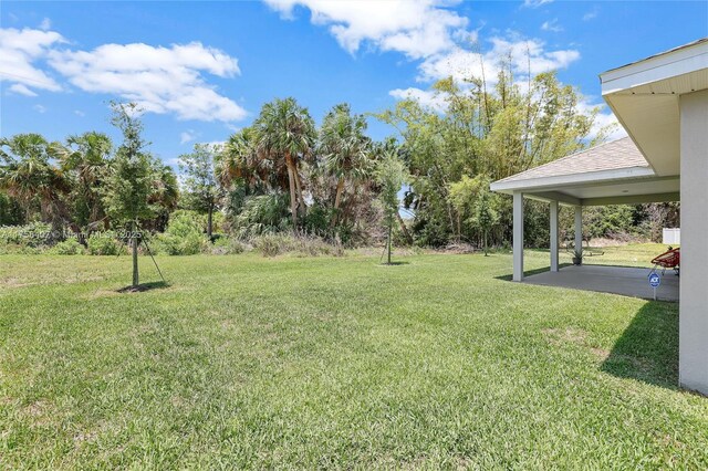 5338 Lugo St, Fort Pierce, FL 34951 - view of yard with a patio