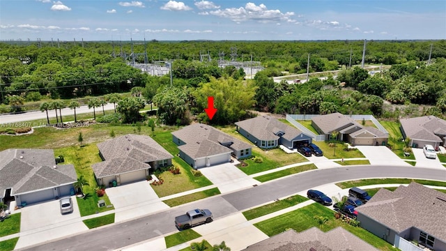 5338 Lugo St, Fort Pierce, FL 34951 - bird's eye view with a residential view and a forest view