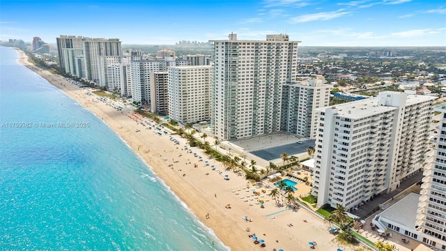 bird's eye view with a view of city, a beach view, and a water view