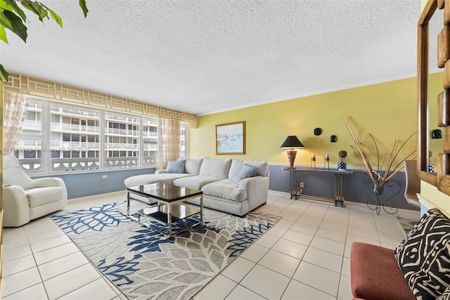 tiled living room featuring ornamental molding and a textured ceiling