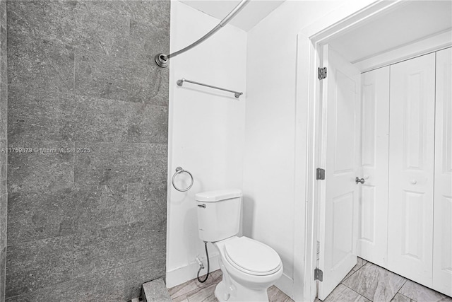 bathroom featuring toilet
