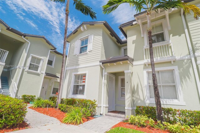 2853 SE 1st Dr Unit 4, Homestead, FL 33033 - view of front of house featuring stucco siding