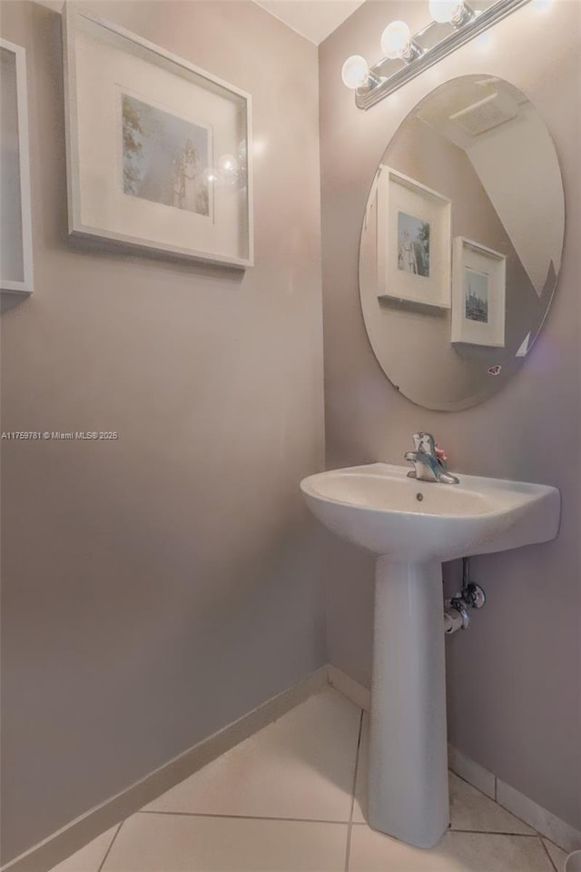 2853 SE 1st Dr Unit 4, Homestead, FL 33033 - bathroom featuring tile patterned floors and baseboards