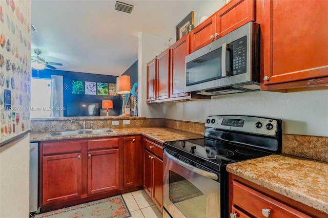 2853 SE 1st Dr Unit 4, Homestead, FL 33033 - kitchen featuring visible vents, a sink, appliances with stainless steel finishes, light tile patterned floors, and ceiling fan