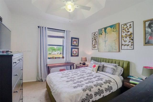 2853 SE 1st Dr Unit 4, Homestead, FL 33033 - bedroom with a tray ceiling, baseboards, carpet, and a ceiling fan