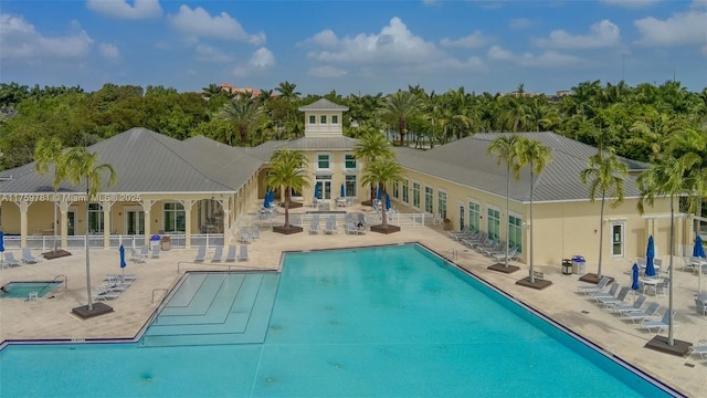2853 SE 1st Dr Unit 4, Homestead, FL 33033 - community pool with a patio and fence