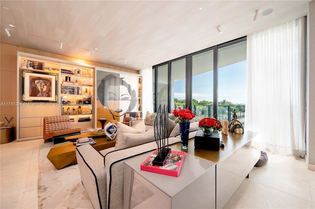 living room with wood ceiling and expansive windows