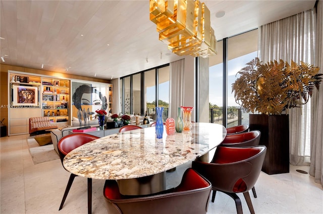 dining room with floor to ceiling windows and wooden ceiling