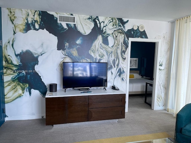 interior space with baseboards and visible vents