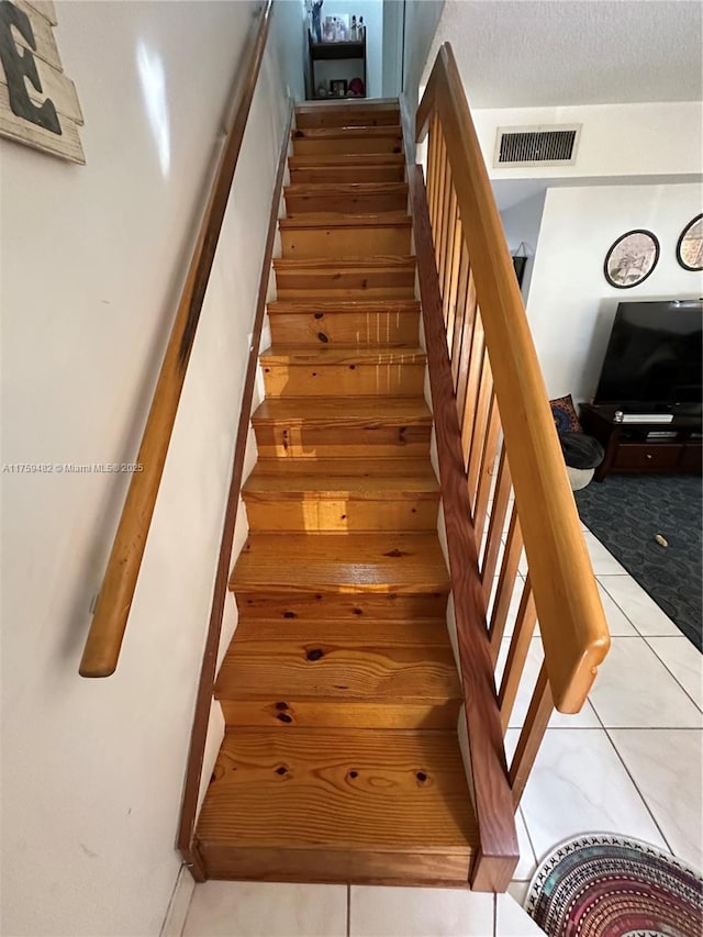 10023 SW 77th Ct, Miami, FL 33156 - staircase with tile patterned floors