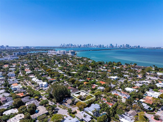 drone / aerial view with a water view and a city view