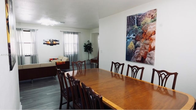 dining room with wood finished floors