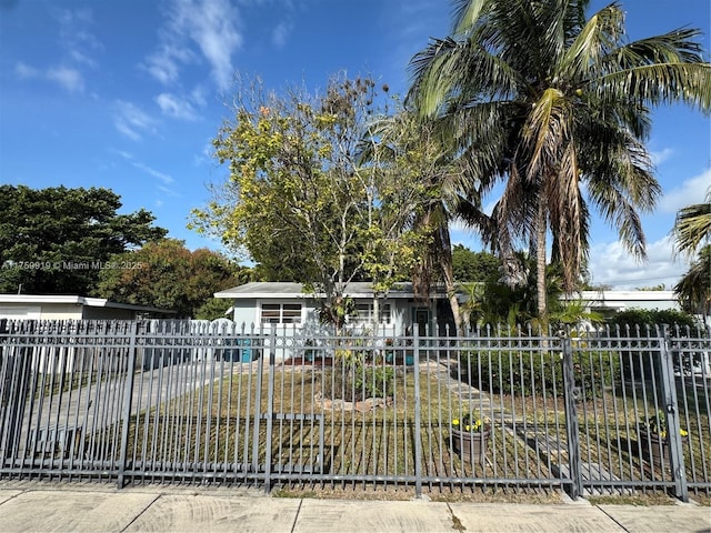 obstructed view of property with fence