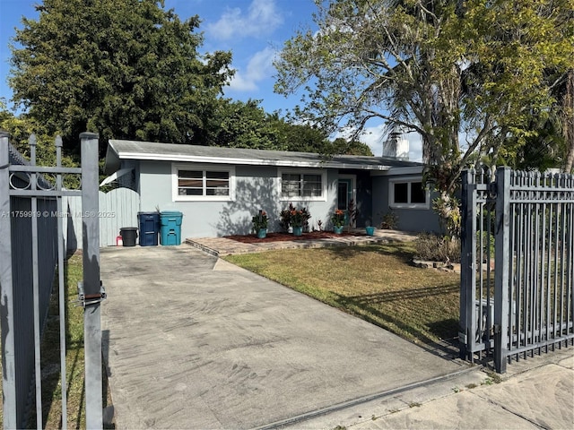 single story home featuring stucco siding, fence, a front lawn, and a gate