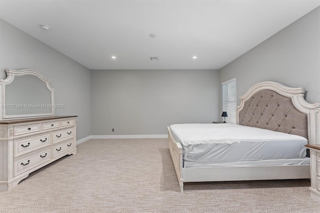 bedroom featuring recessed lighting, visible vents, light colored carpet, and baseboards