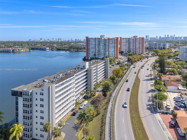 1175 NE Miami Gardens Dr Unit 610, Miami, FL 33179 - drone / aerial view of city skyline, a highway, and a large body of water