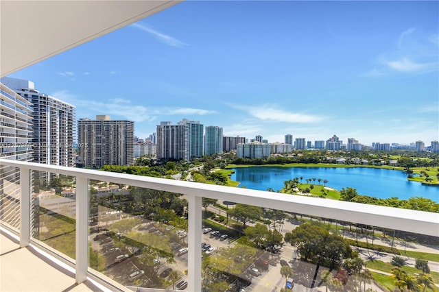 balcony with a view of city and a water view