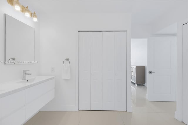 bathroom featuring vanity and tile patterned flooring