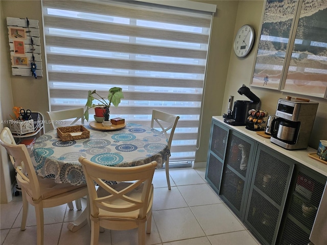 dining area featuring light tile patterned floors