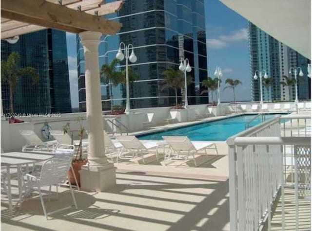 1200 Brickell Bay Dr Unit 3318, Miami, FL 33131 - community pool with a patio area