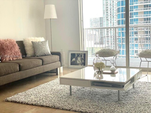 1200 Brickell Bay Dr Unit 3318, Miami, FL 33131 - living room with healthy amount of natural light and a city view