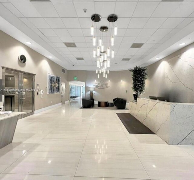 1200 Brickell Bay Dr Unit 3318, Miami, FL 33131 - building lobby with a drop ceiling
