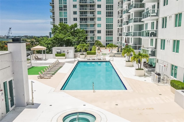 community pool with a patio