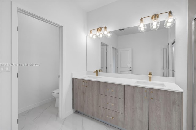 full bath with double vanity, toilet, visible vents, and a sink