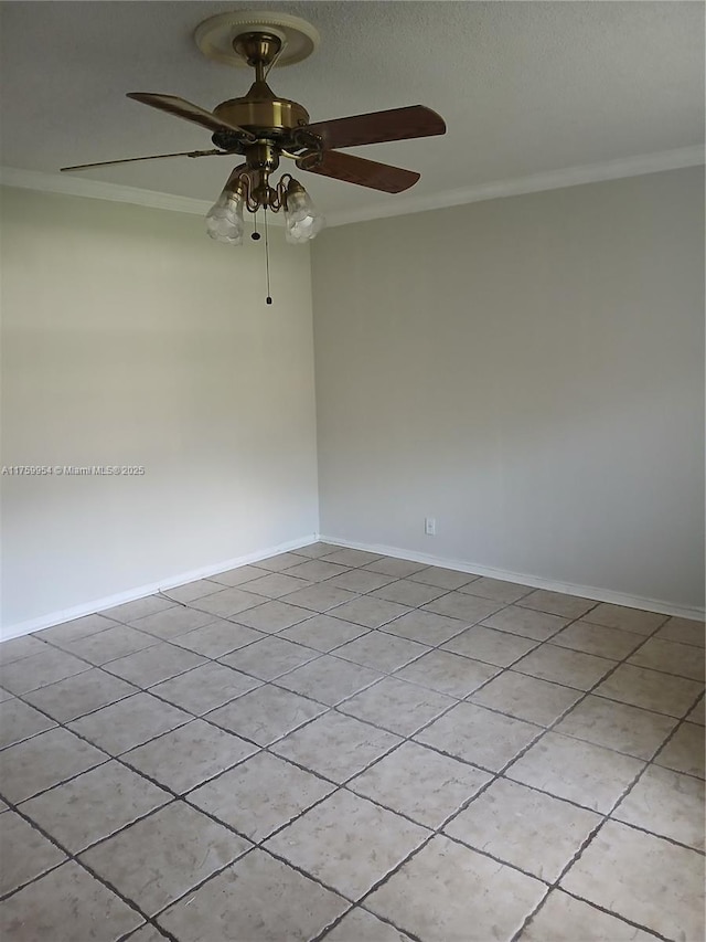 empty room featuring baseboards, a textured ceiling, ornamental molding, and a ceiling fan