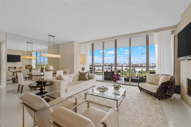 living area with floor to ceiling windows