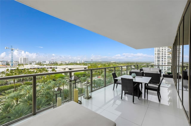 balcony featuring a view of city and an outdoor hangout area