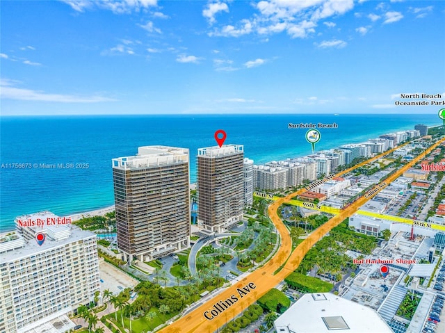 aerial view with a city view and a water view