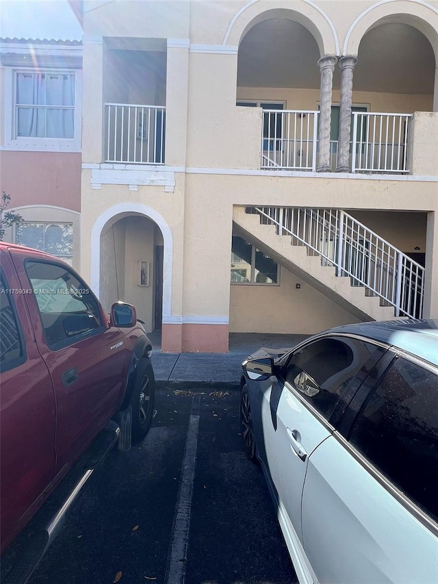 view of building exterior featuring stairway