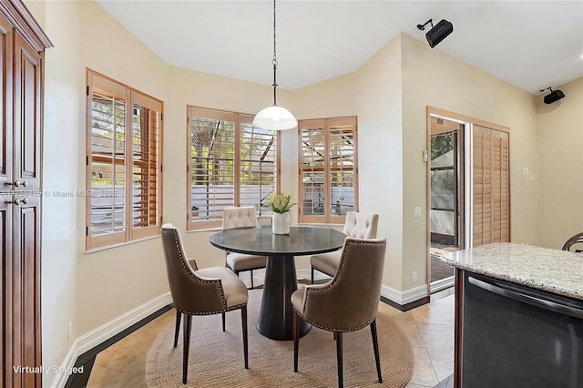 5523 NW 57th Ter, Coral Springs, FL 33067 - dining space with baseboards and light tile patterned floors