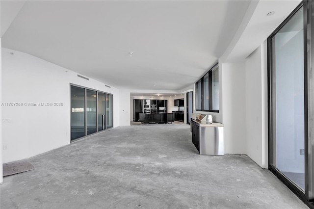 interior space with concrete floors