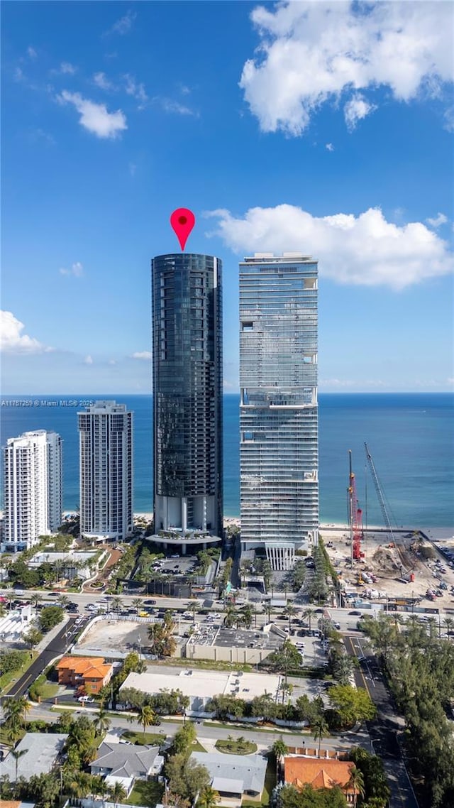 bird's eye view featuring a city view and a water view