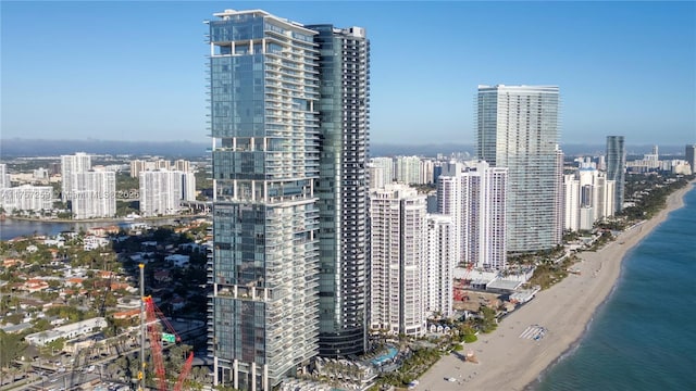 property's view of city with a beach view and a water view