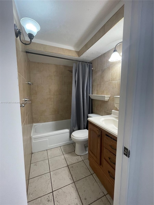 bathroom featuring toilet, vanity, tile patterned floors, tile walls, and shower / bathtub combination with curtain