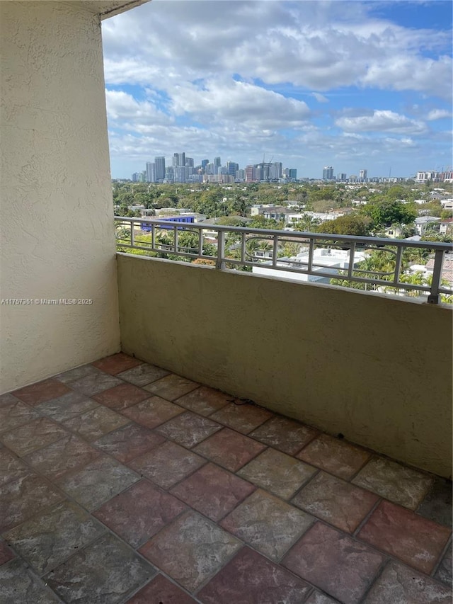 balcony featuring a city view