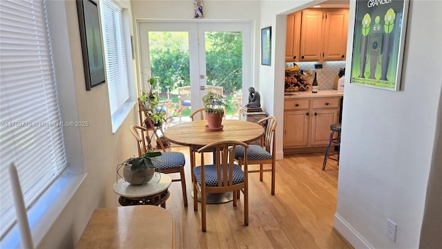 dining room featuring light wood-type flooring