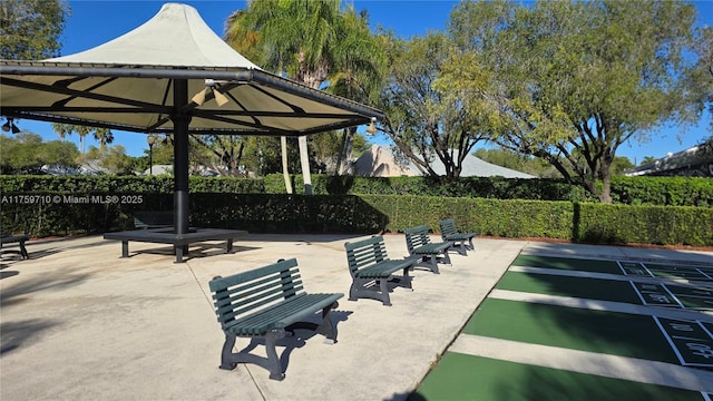 view of community featuring shuffleboard