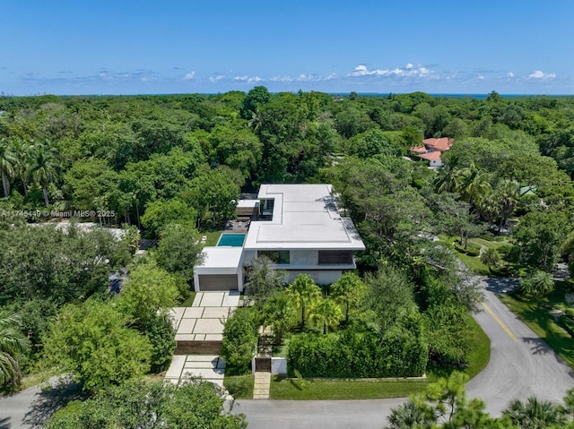 bird's eye view featuring a forest view