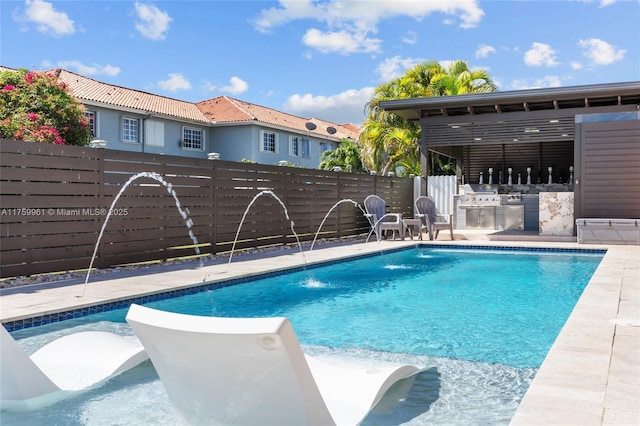 view of pool featuring a fenced in pool, area for grilling, a fenced backyard, a patio area, and a grill