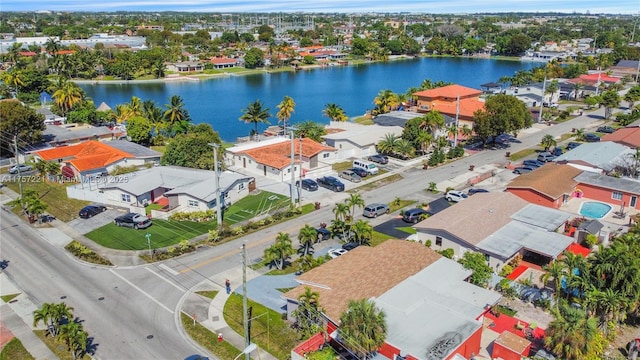 aerial view with a residential view and a water view